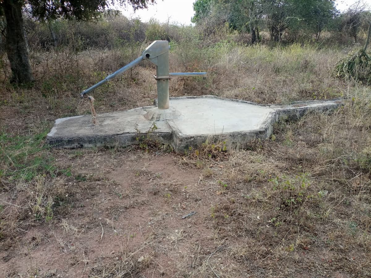 A hand-pump borehole supporting rural water access.